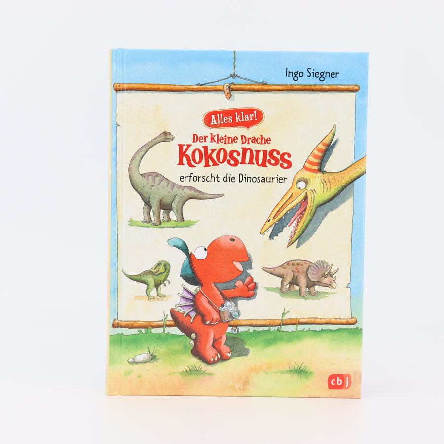 Grundschul-Buch - Cbj -  -  - Der kleine Drache Kokosnuss, erforscht die Dinosaurier - Sehr guter Zustand